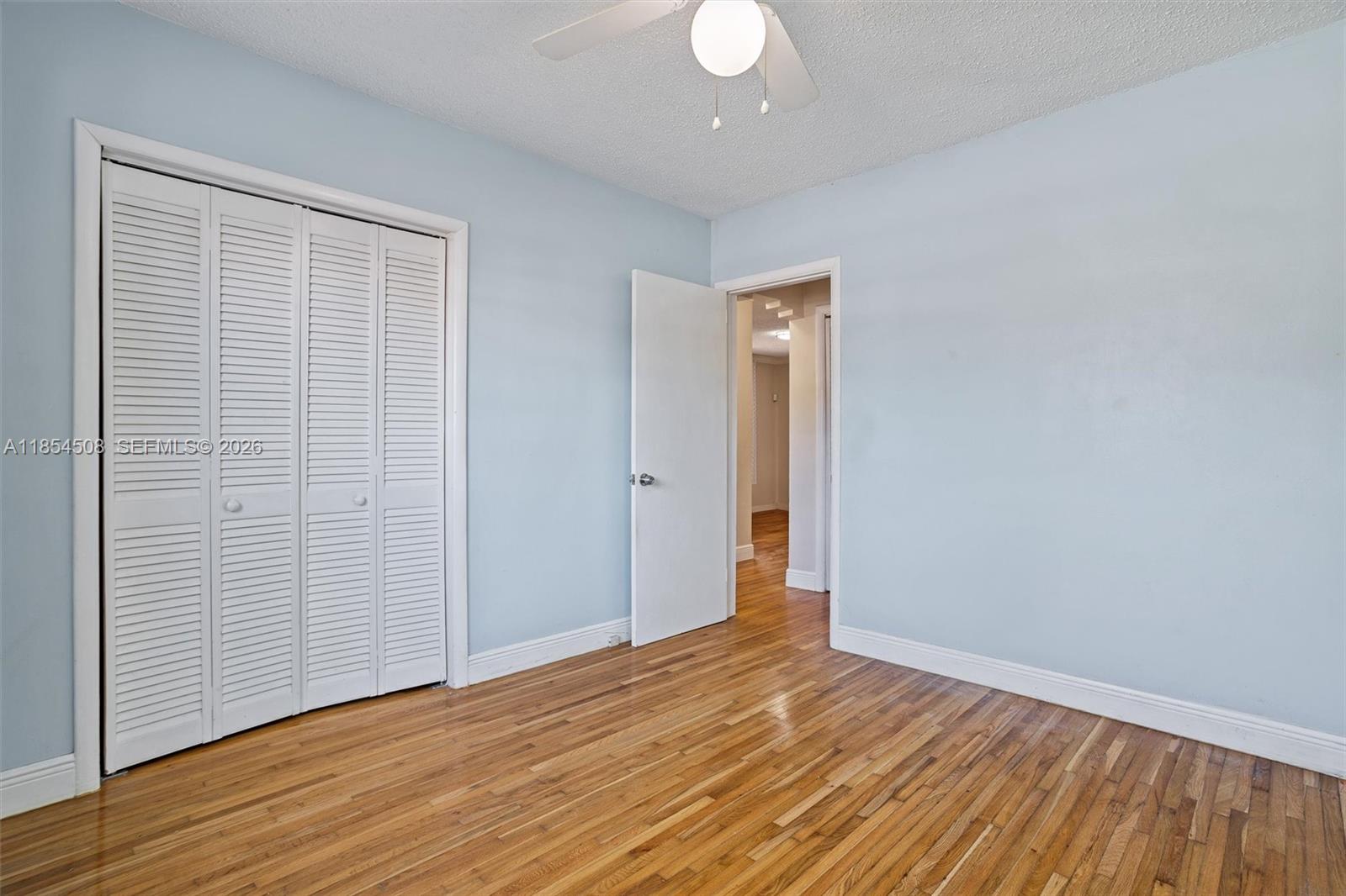 1701 Southwest 21st Street Miami, FL 33145 - Photo 24 of 28 a view of a livingroom with wooden floor