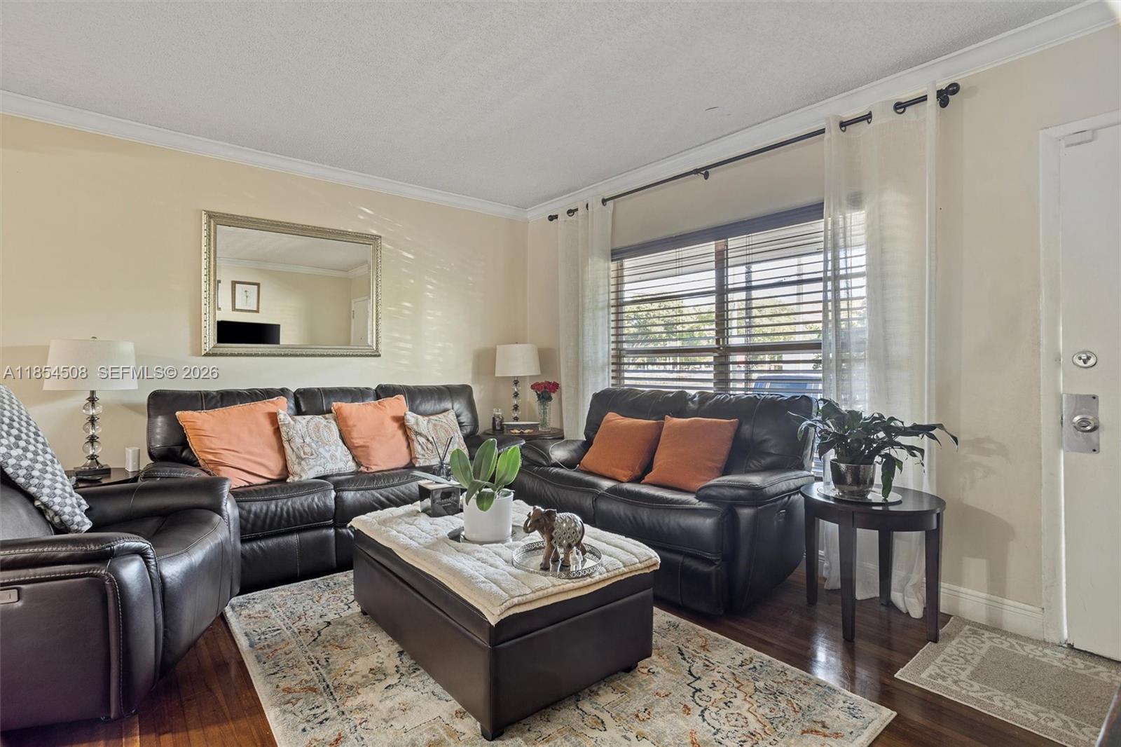 1701 Southwest 21st Street Miami, FL 33145 - Photo 4 of 28 a living room with furniture and a window