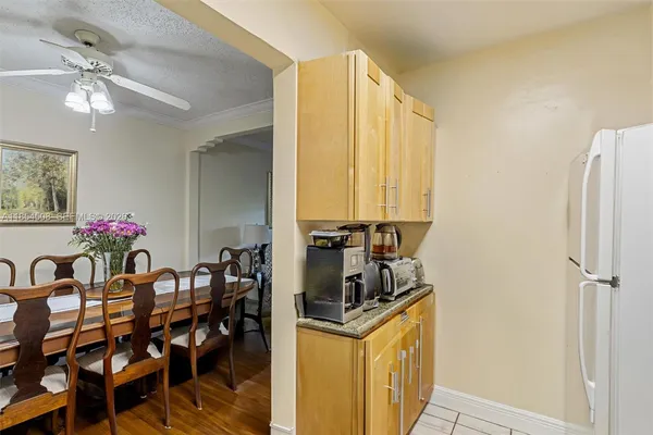 a very nice looking dining room with a dining table and chairs