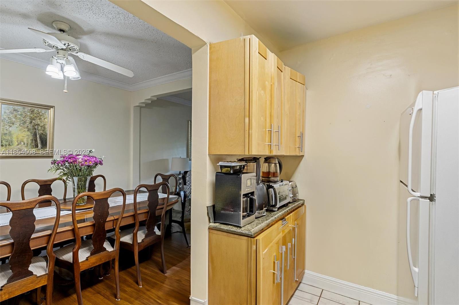 1701 Southwest 21st Street Miami, FL 33145 - Photo 7 of 28 a very nice looking dining room with a dining table and chairs
