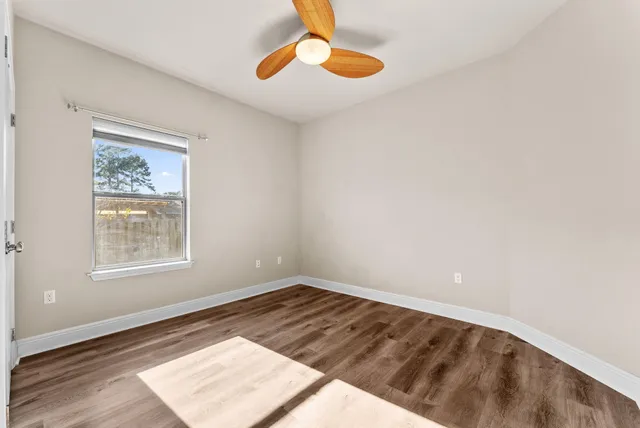 a view of an outdoor space and tennis court
