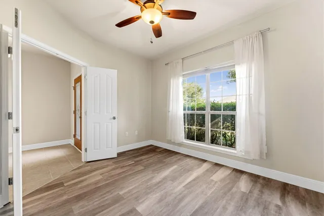 a kitchen with stainless steel appliances granite countertop a refrigerator a stove top oven a sink and dishwasher