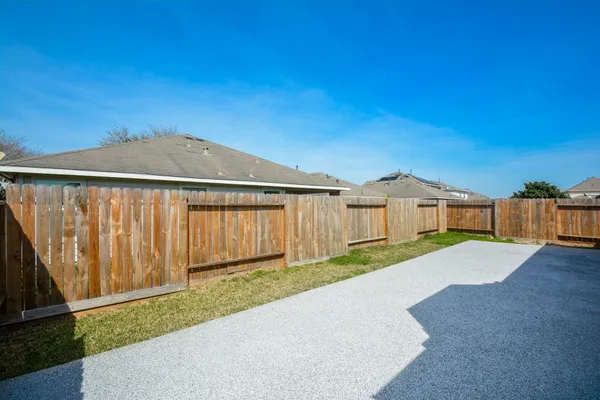 a view of a back yard of the house