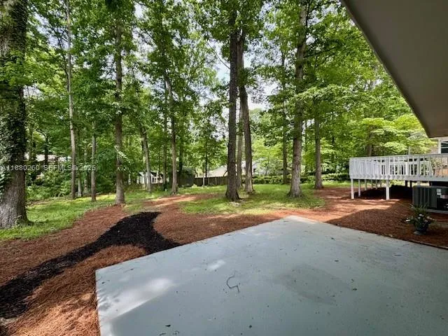 a view of street with parked cars