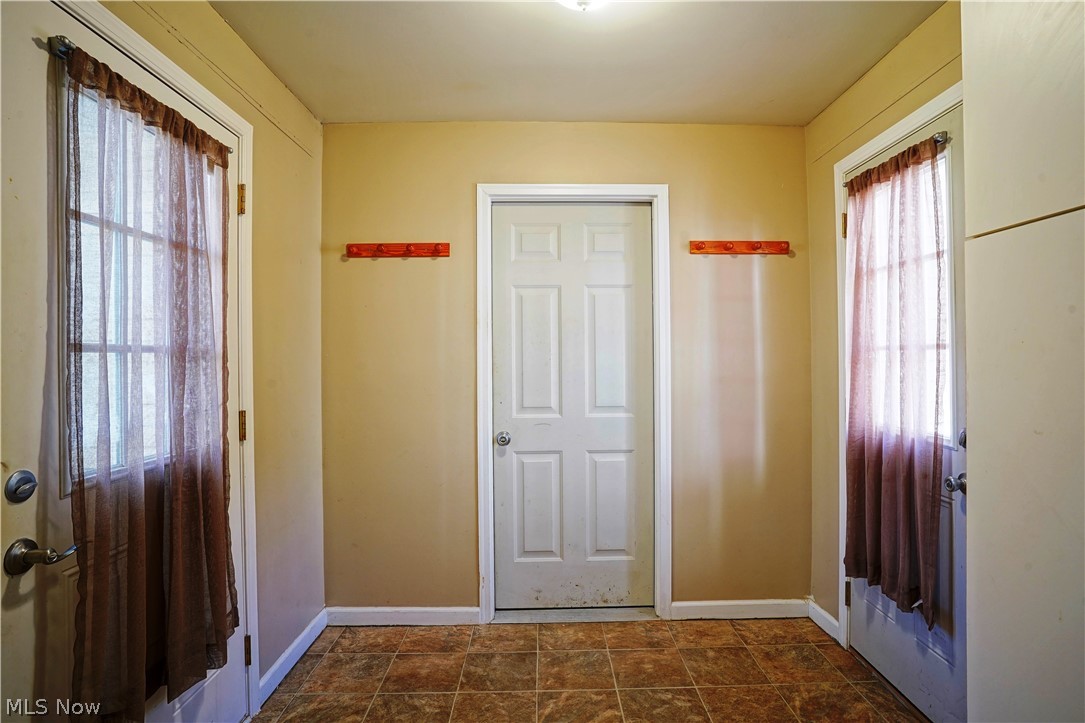 Breezeway to garage and leads to the kithcen.