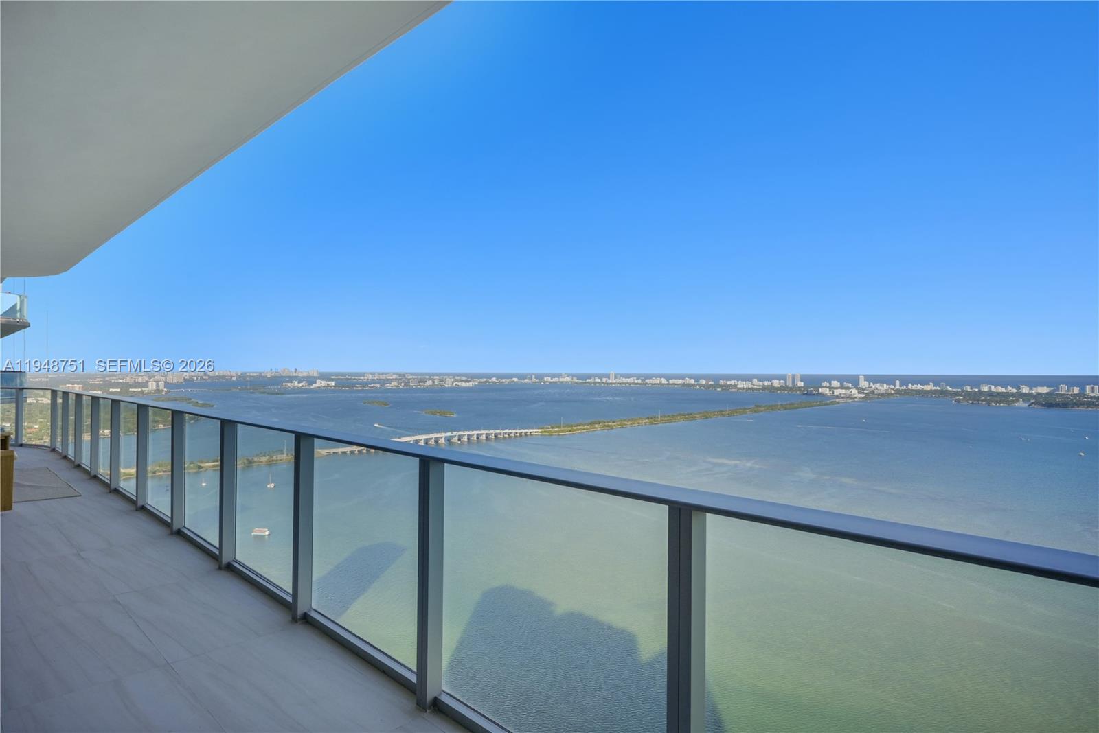 700 Northeast 24th Street, Unit PH5801 Miami, FL 33137 - Photo 5 of 81 a view of a balcony with an ocean view