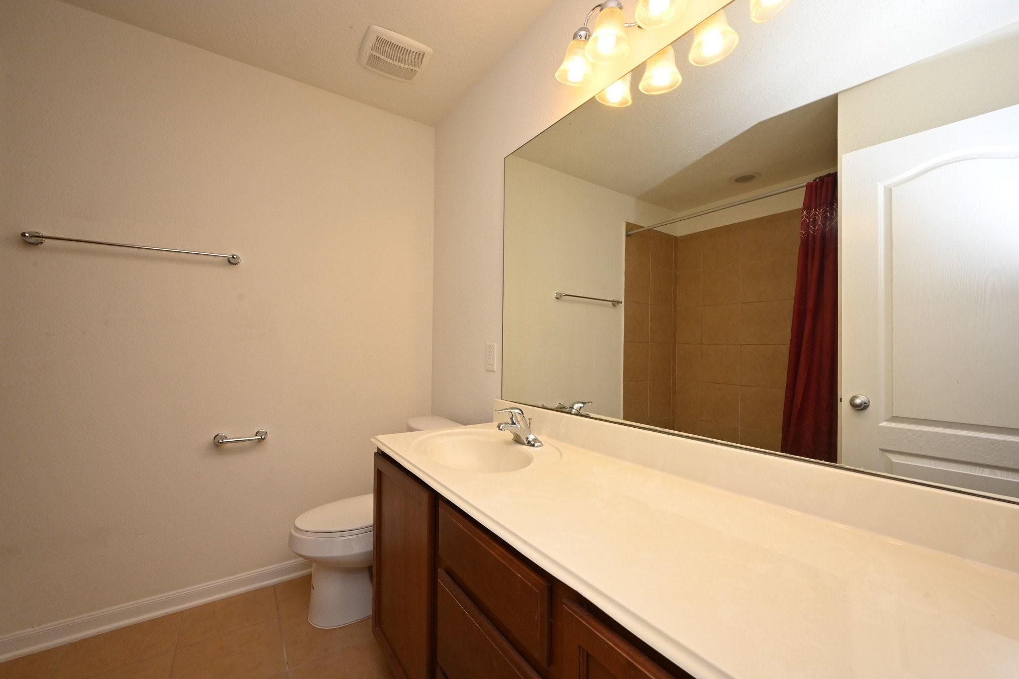 21119 Keystone Pine Court Katy, TX 77449 - Photo 36 of 43 a bathroom with a sink a toilet and a mirror