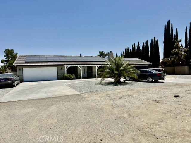 13375 Rincon Road Apple Valley, CA 92308 - Photo 70 of 72 a view of a terrace with a chair