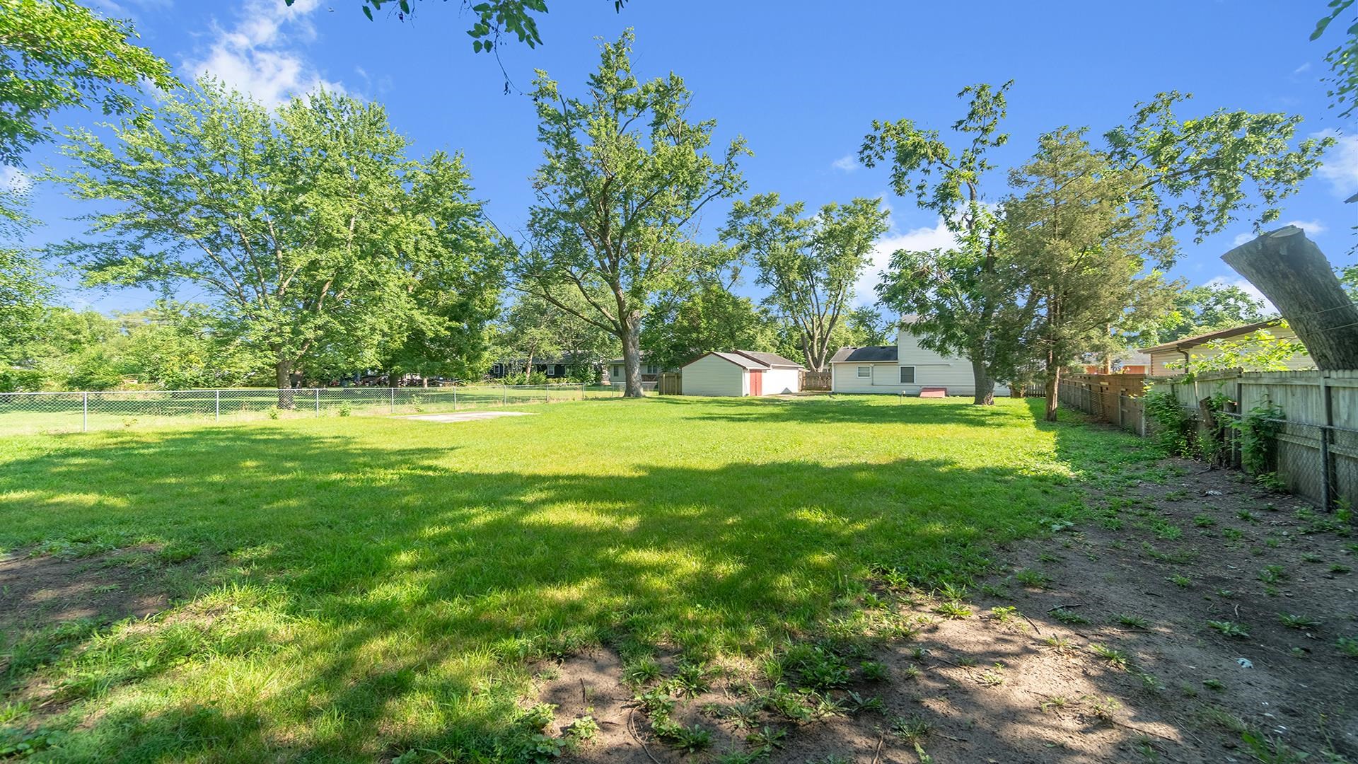 820 East Riverside Boulevard Loves Park, IL 61111 - Photo 28 of 32 a view of outdoor space with a garden