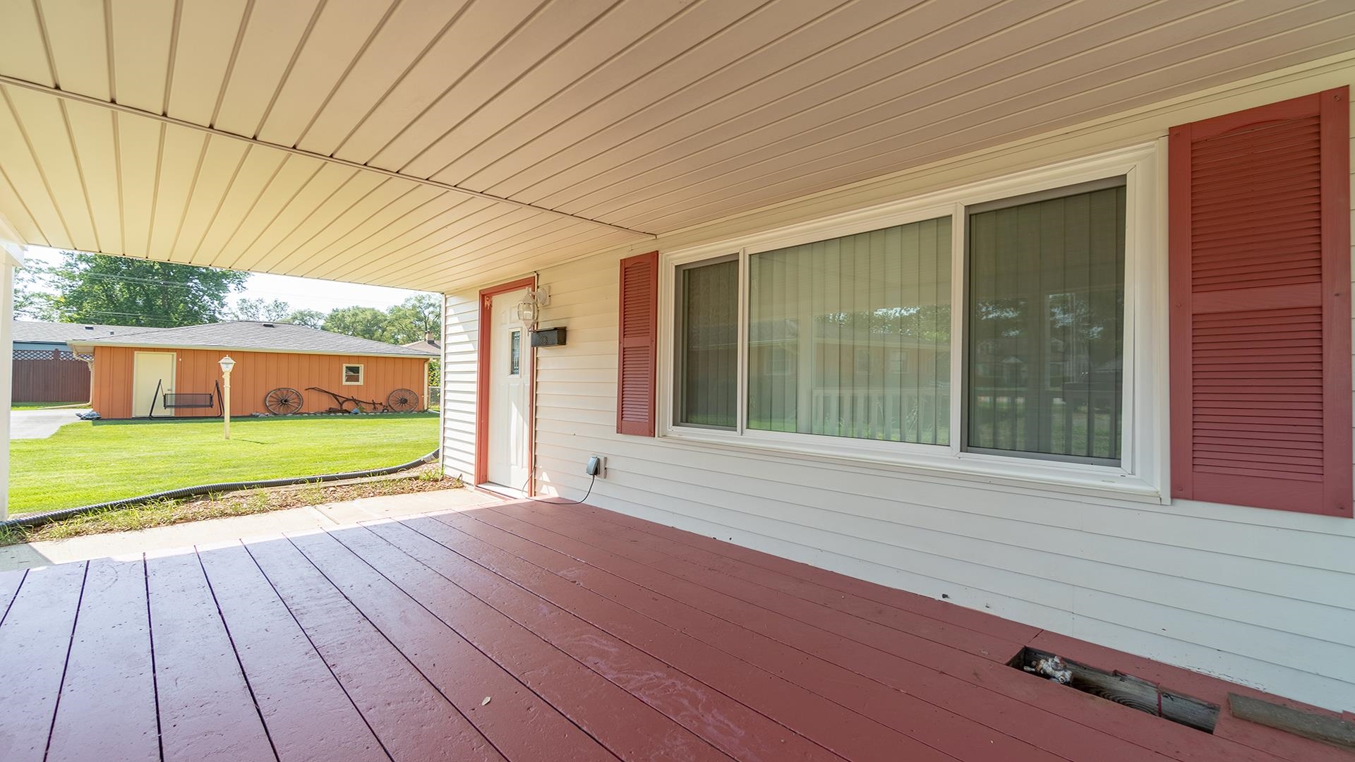 820 East Riverside Boulevard Loves Park, IL 61111 - Photo 4 of 32 a view of an empty room with a yard