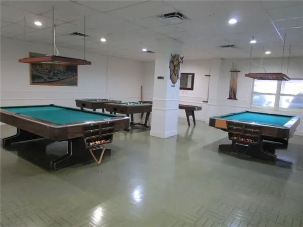 a room with toys and wooden floor