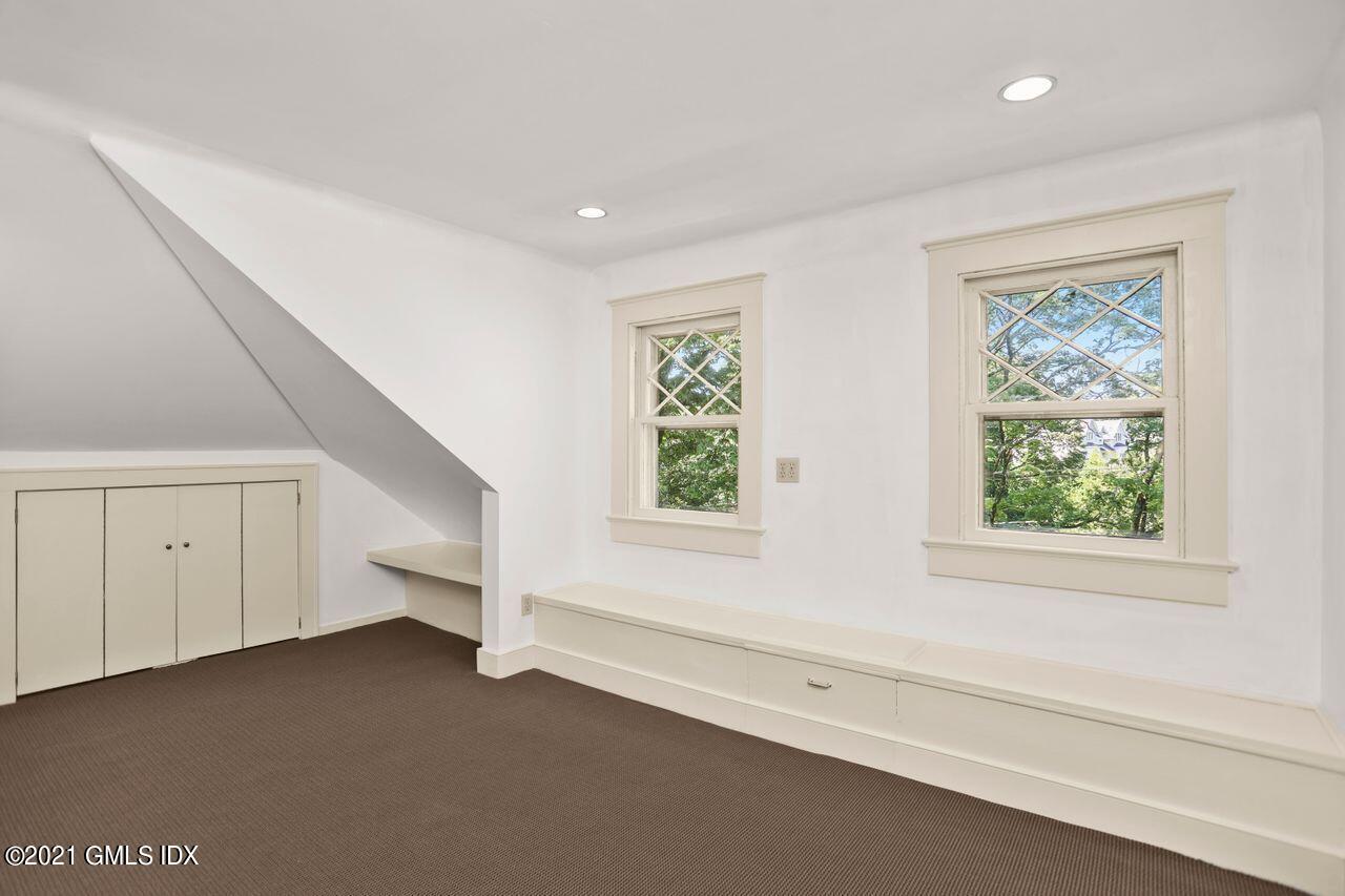27 Sachem Road Greenwich, CT 06830 - Photo 27 of 50 a view of room with hardwood flooring and ceiling fan