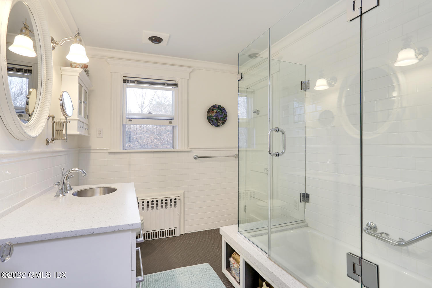 27 Sachem Road Greenwich, CT 06830 - Photo 43 of 50 a bathroom with a sink a toilet and shower