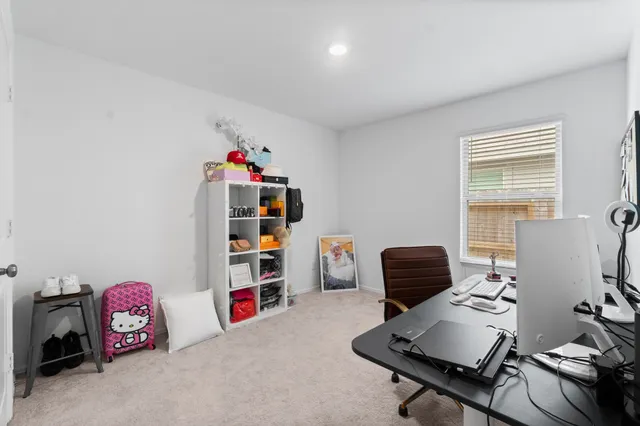 a bathroom with a sink mirror and vanity