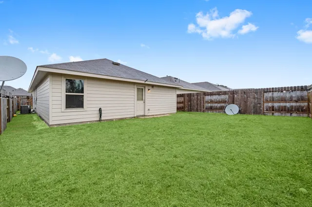 a view of a yard with a slide