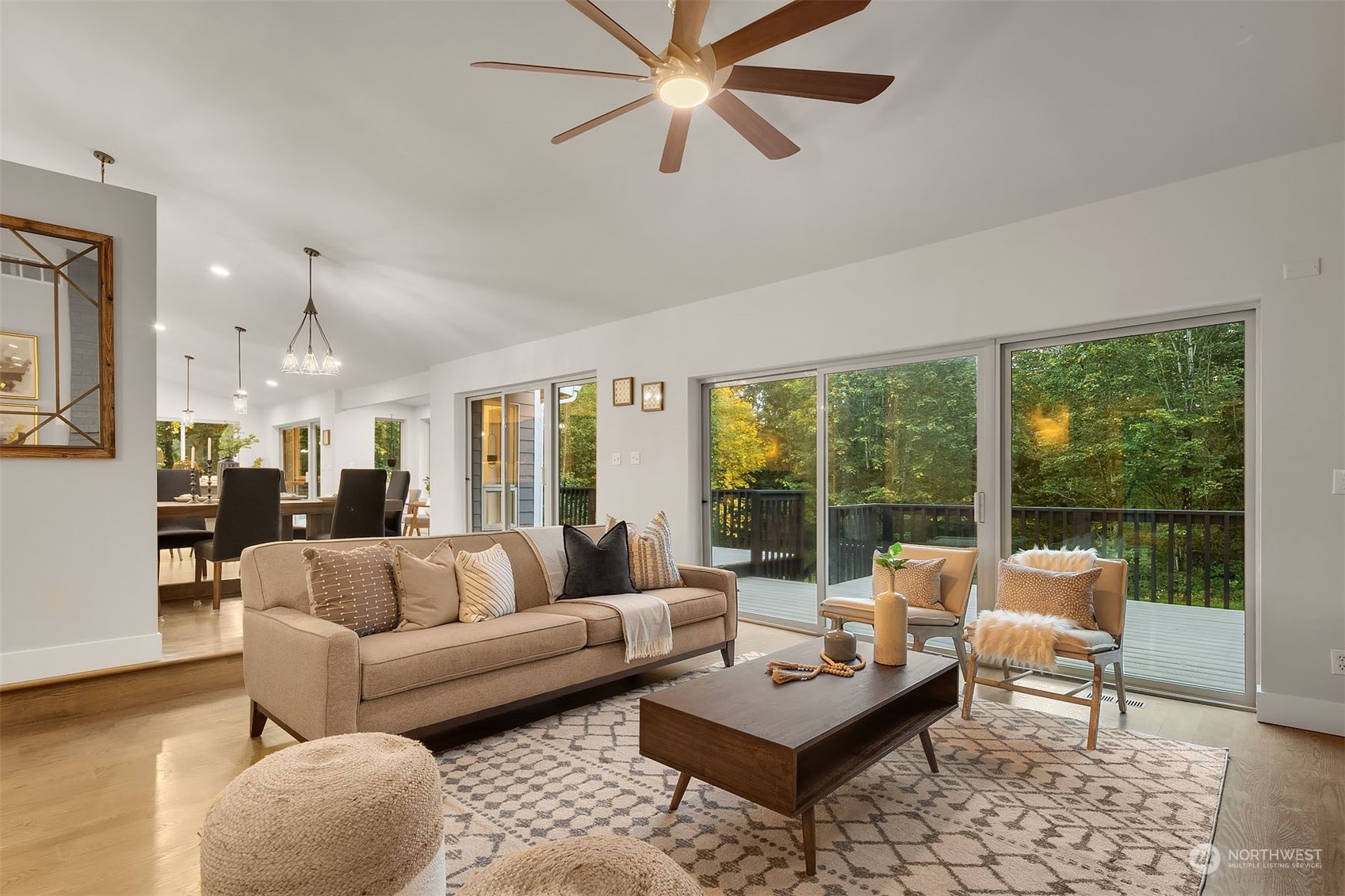 14741 209th Avenue Southeast Renton, WA 98059 - Photo 16 of 39 a living room with furniture and a large window