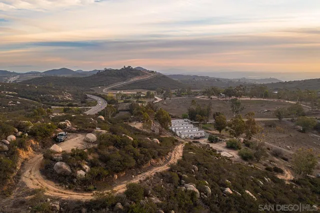 a view of a city with mountains in the background