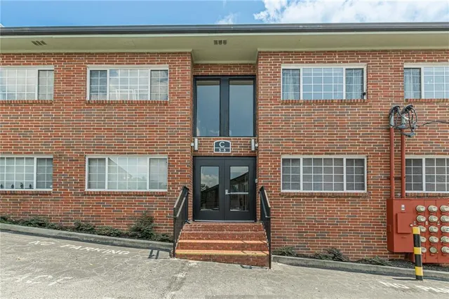 a front view of a house having yard