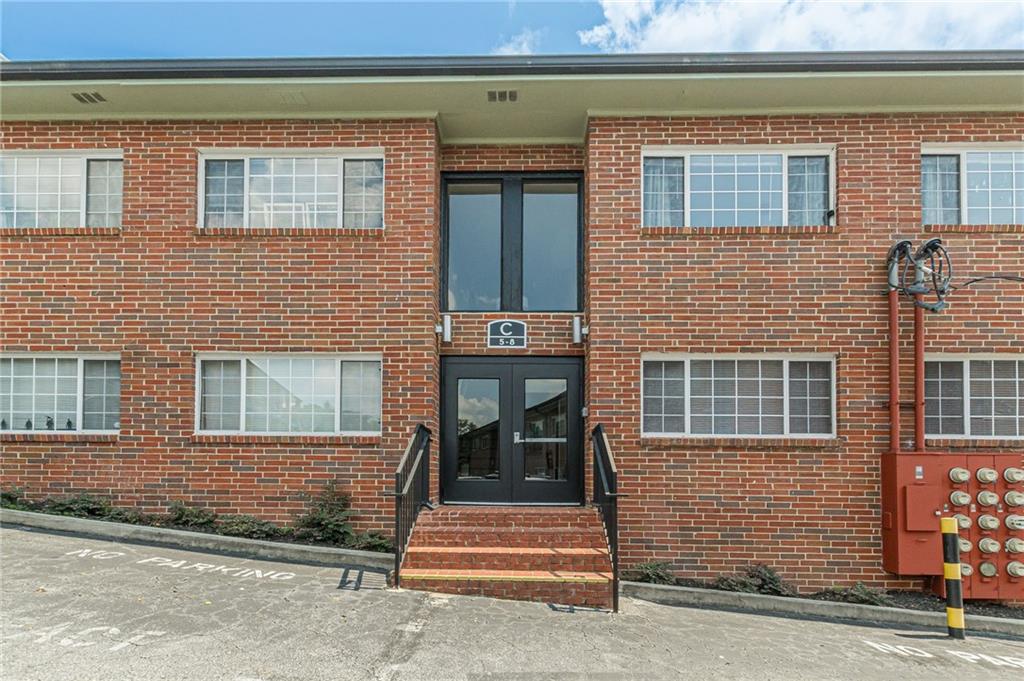 a front view of a house having yard