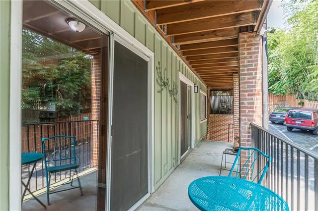 a porch with seating space