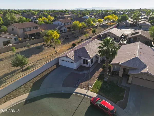 an aerial view of a house with a garden