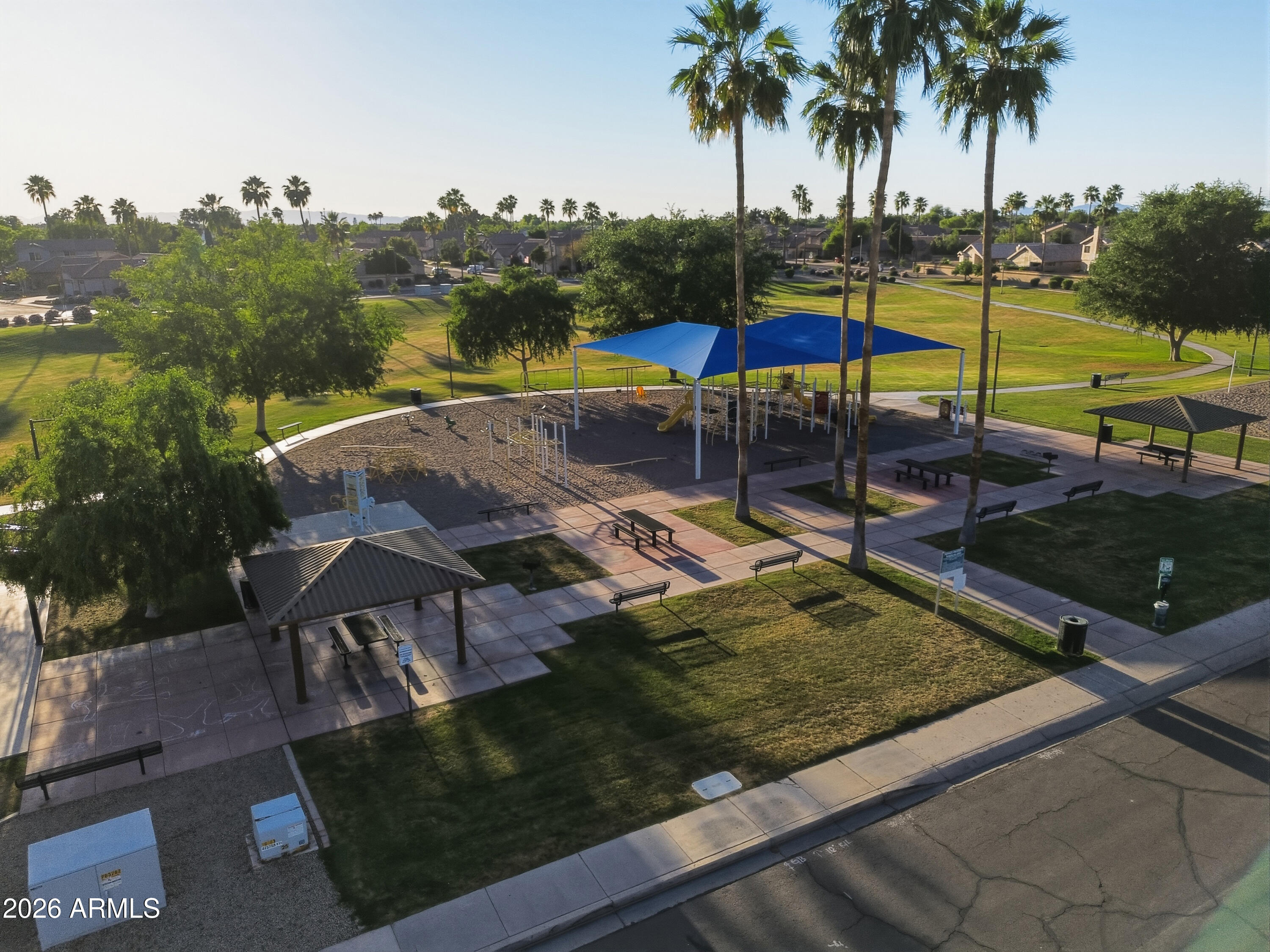 1994 South Spartan Street Gilbert, AZ 85233 - Photo 21 of 30 a view of a swimming pool with a patio and a yard