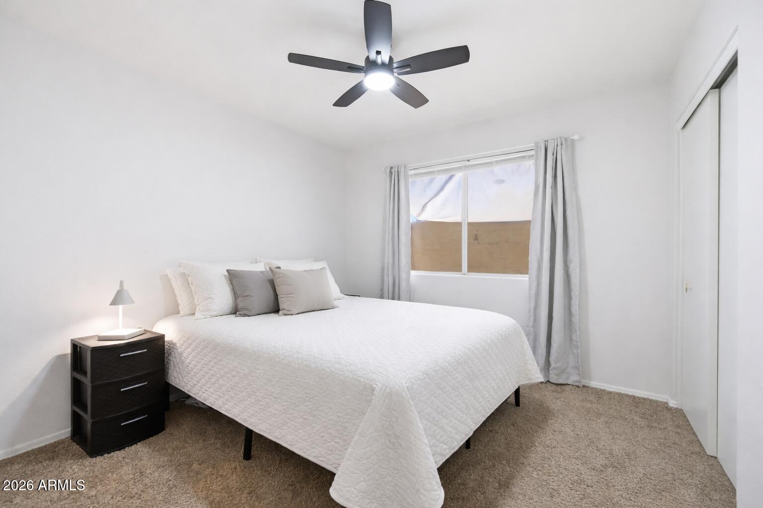 1994 South Spartan Street Gilbert, AZ 85233 - Photo 9 of 30 a bedroom with a bed and window