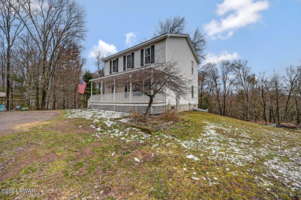 19 Ripple Lane Beach Lake, PA 18405 - Photo 41 of 52 a front view of a house with a yard