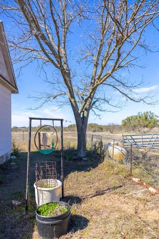 a view of a staircase with a table and a chandelier