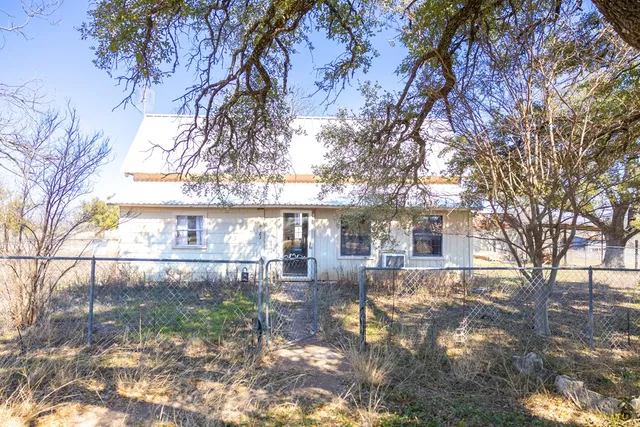 a street view with sitting space and garden view