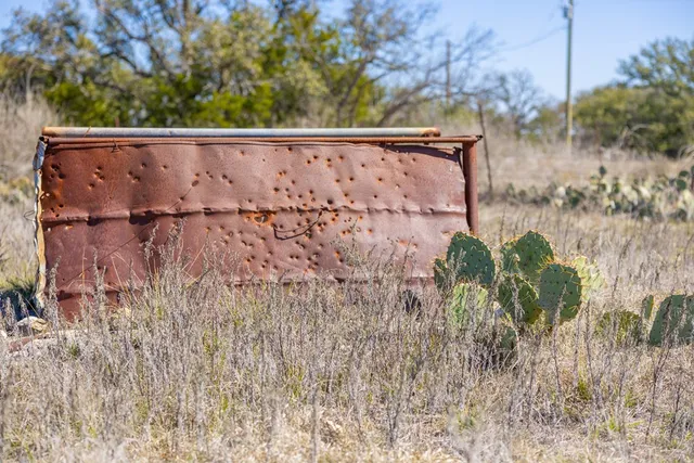 a view of a lake with a yard