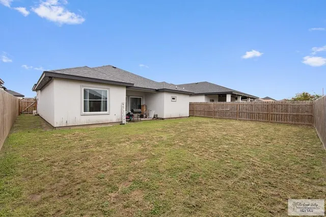 a house view with a garden space