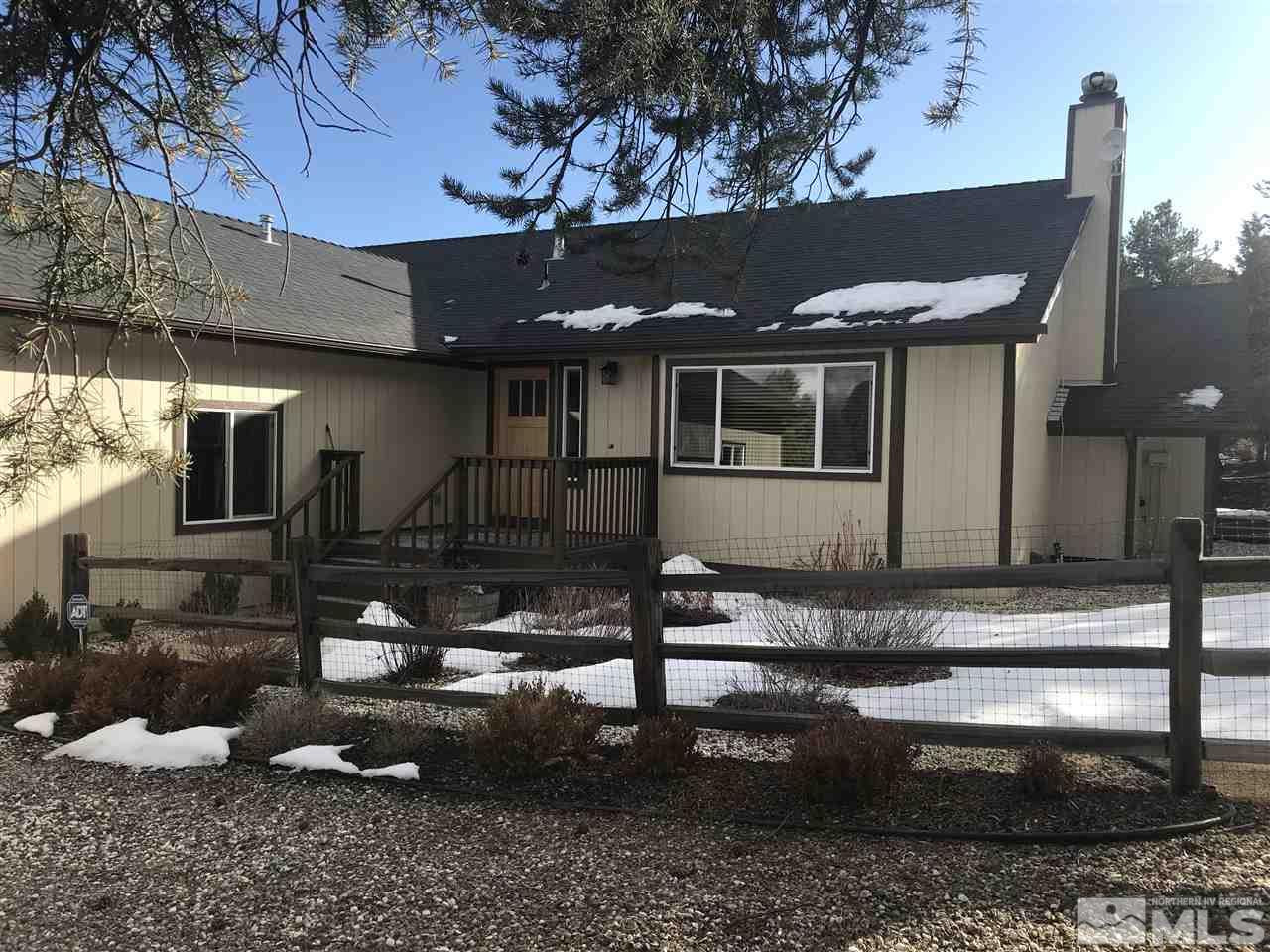 21715 Sazarac Road Reno, NV 89521 - Photo 1 of 25 a front view of a house with garden