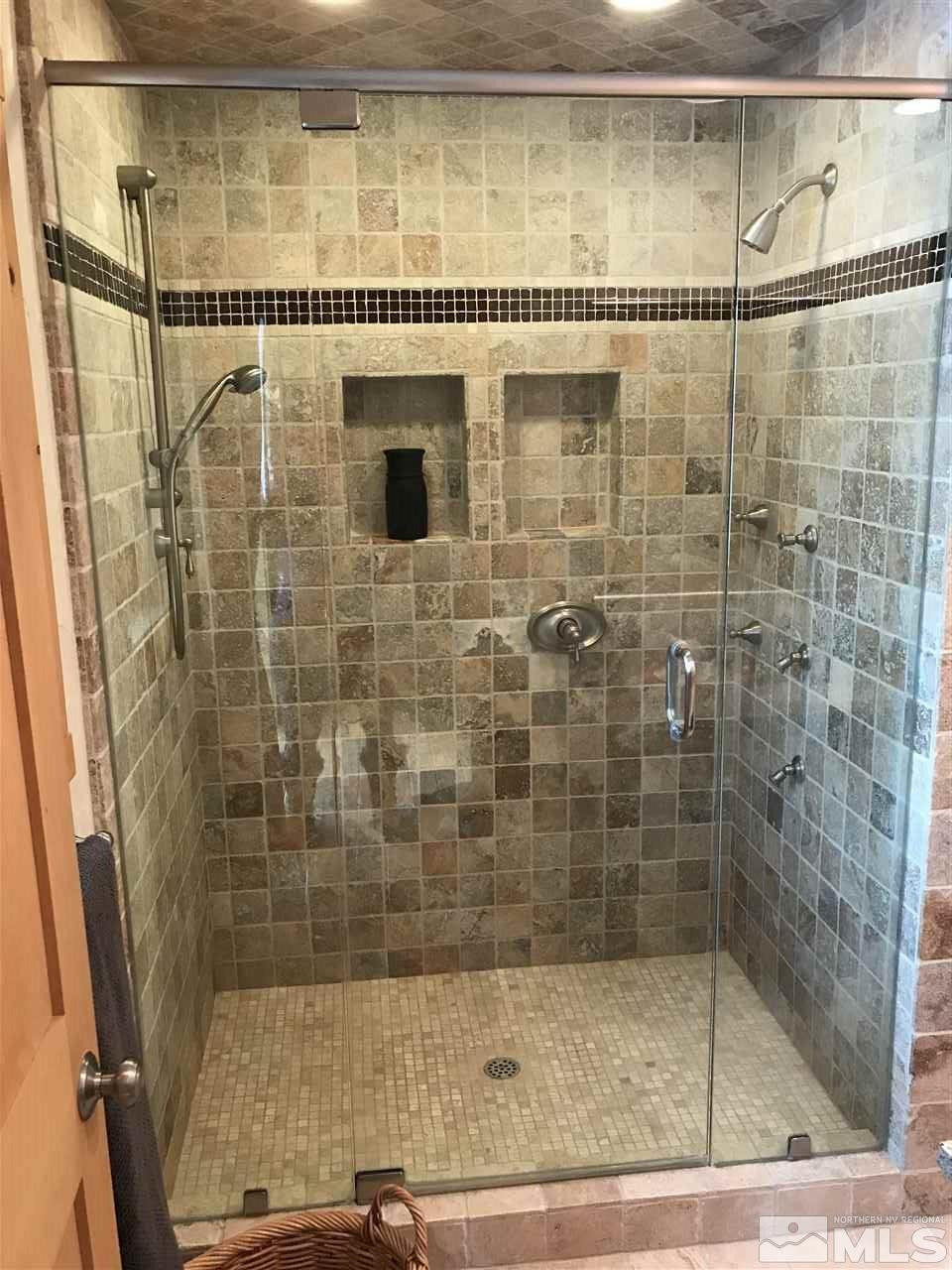 21715 Sazarac Road Reno, NV 89521 - Photo 15 of 25 a bathroom with a shower