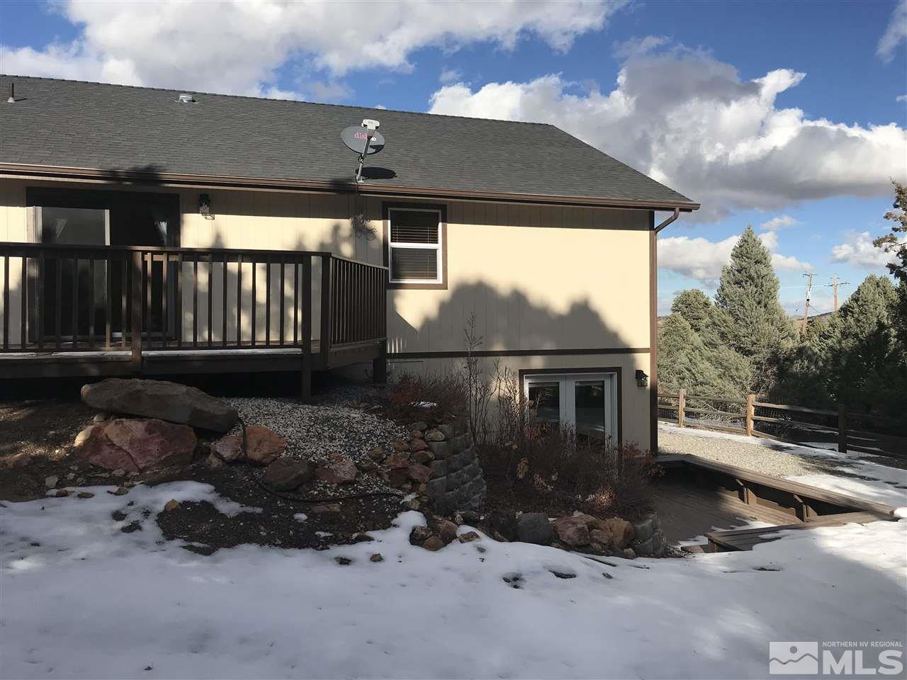 21715 Sazarac Road Reno, NV 89521 - Photo 21 of 25 front view of house with a yard