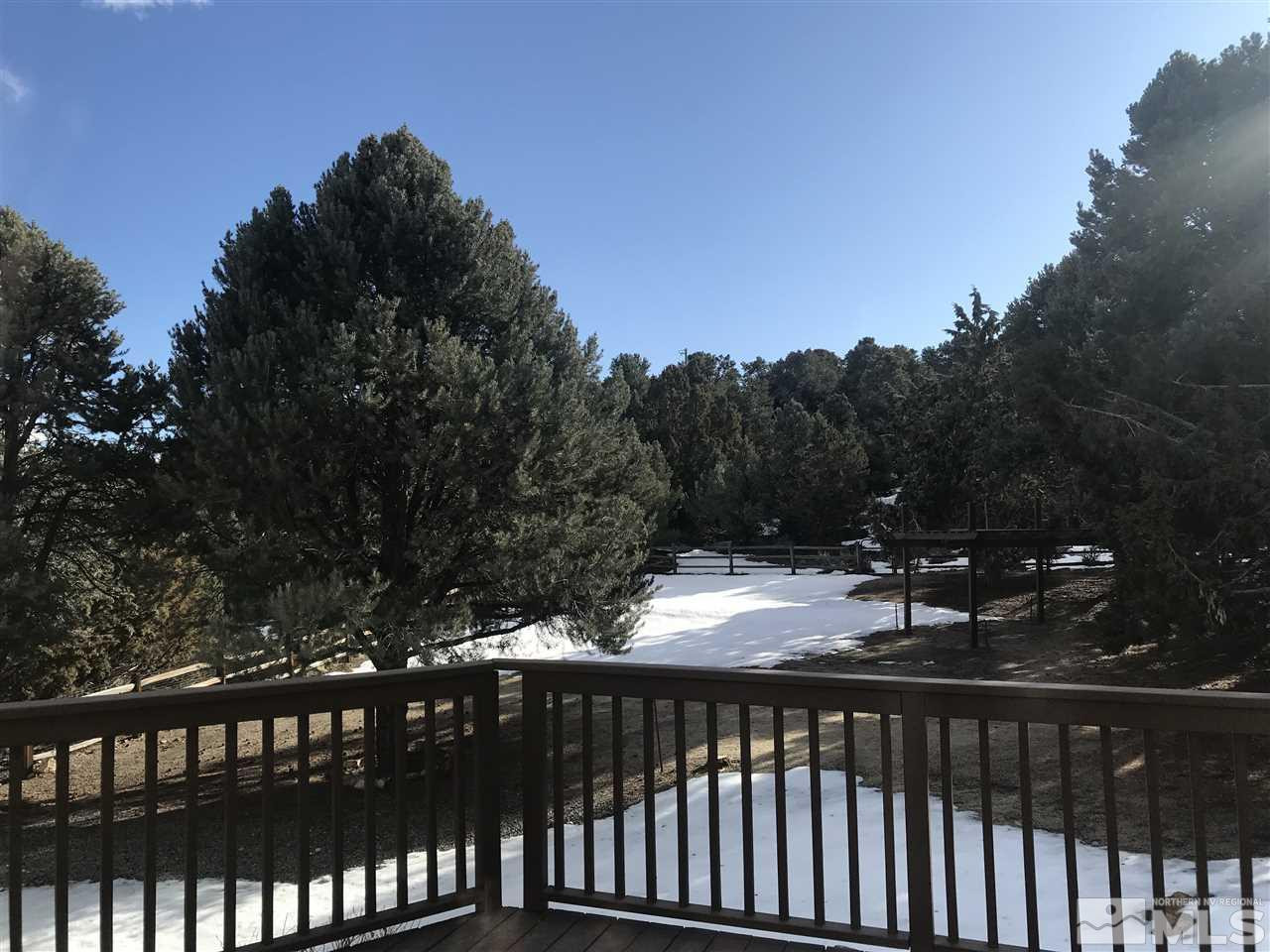 21715 Sazarac Road Reno, NV 89521 - Photo 24 of 25 a view of a roof deck
