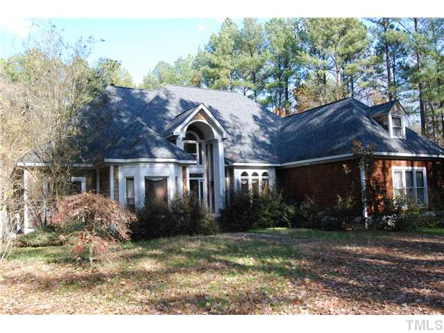807 Neodak Road Apex, NC 27523 - Photo 1 of 12 Lots of Square Footage for a very low Price! Priced way below the Tax Value! 3.25 Acre Lot with a Mile of Fenced Back Yard. Nice Transitional Home that needs a little TLC.