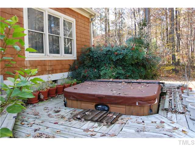 807 Neodak Road Apex, NC 27523 - Photo 7 of 12 Lower Tier of the Decking that has the Hot Tub built in.