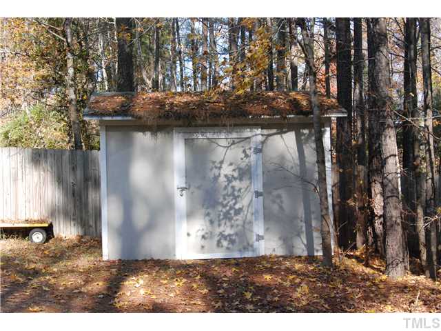 807 Neodak Road Apex, NC 27523 - Photo 10 of 12 Storage Building with Shelving.