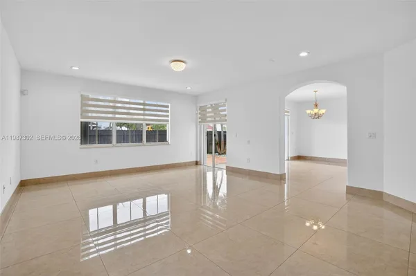 a bathroom with a toilet a sink and a shower