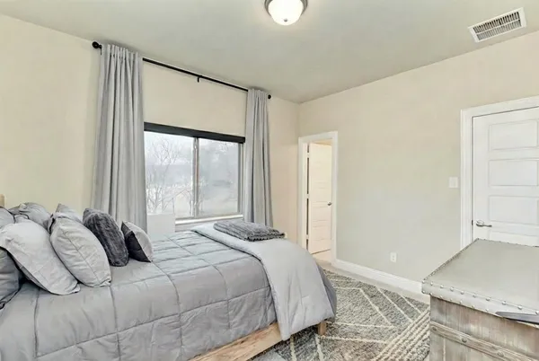 a kitchen with a refrigerator stove and microwave