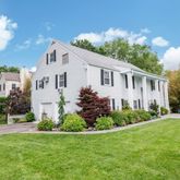 a house view with a garden space
