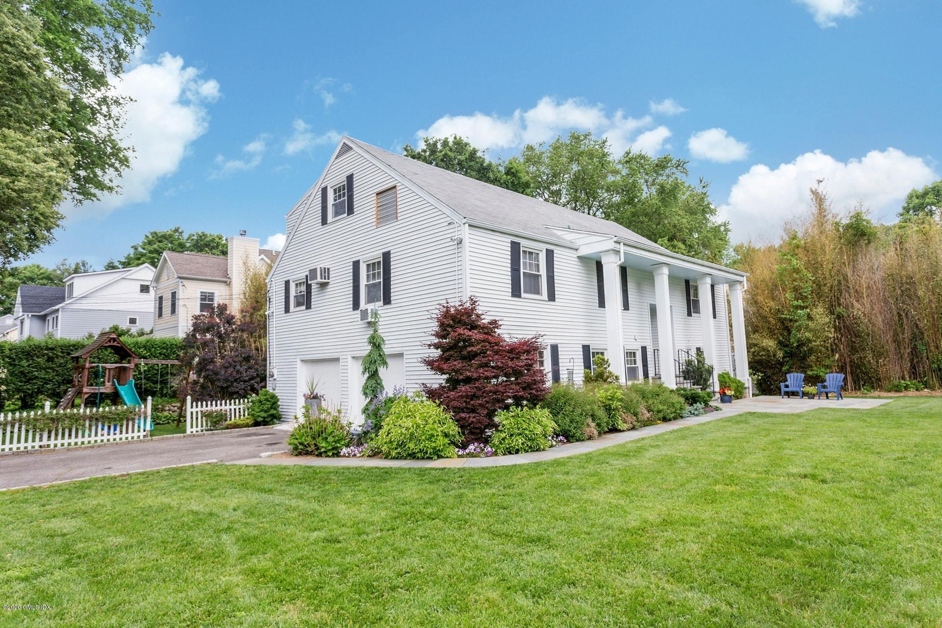 a house view with a garden space