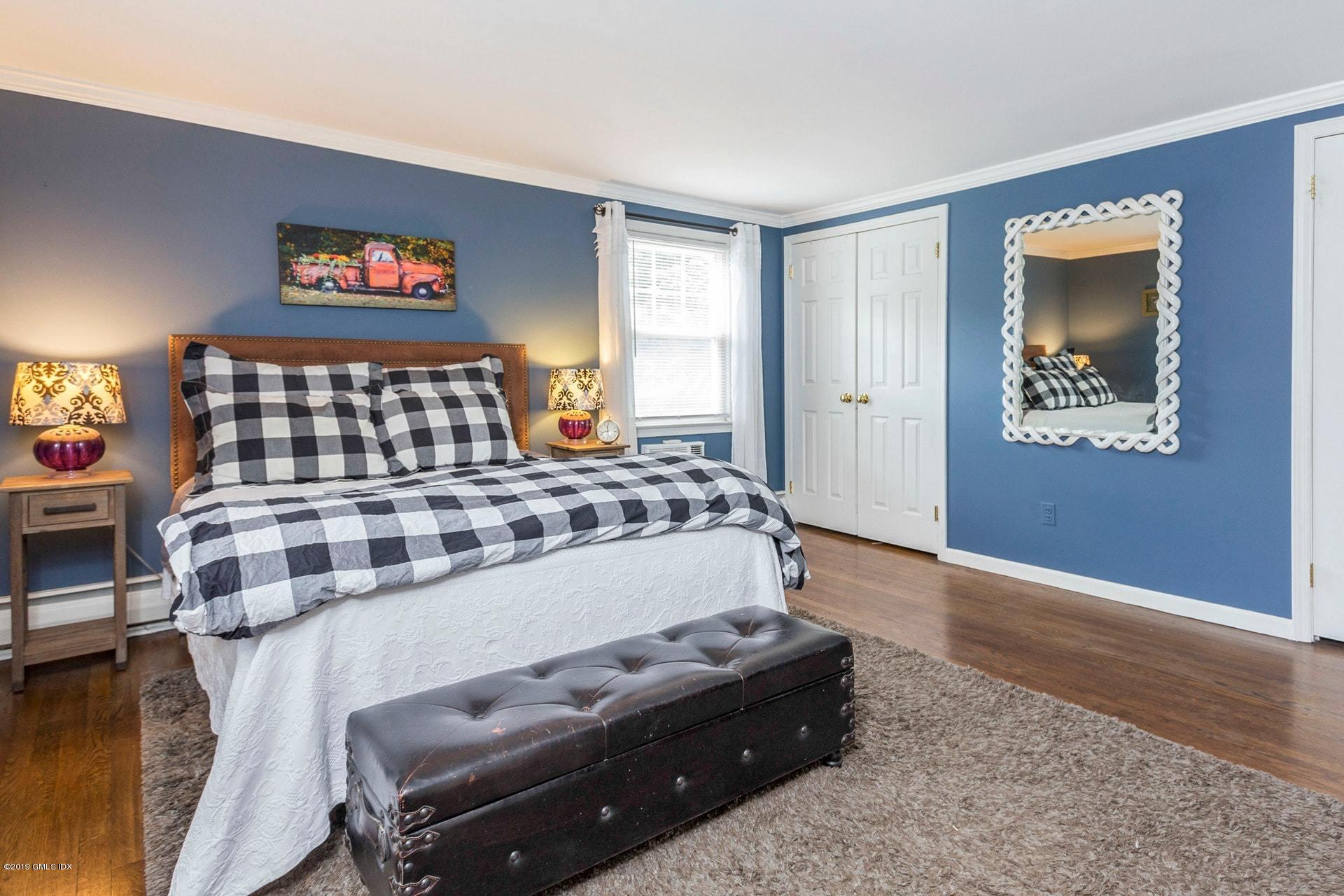 37 Meyer Place Riverside, CT 06878 - Photo 13 of 25 a bedroom with a bed and a window