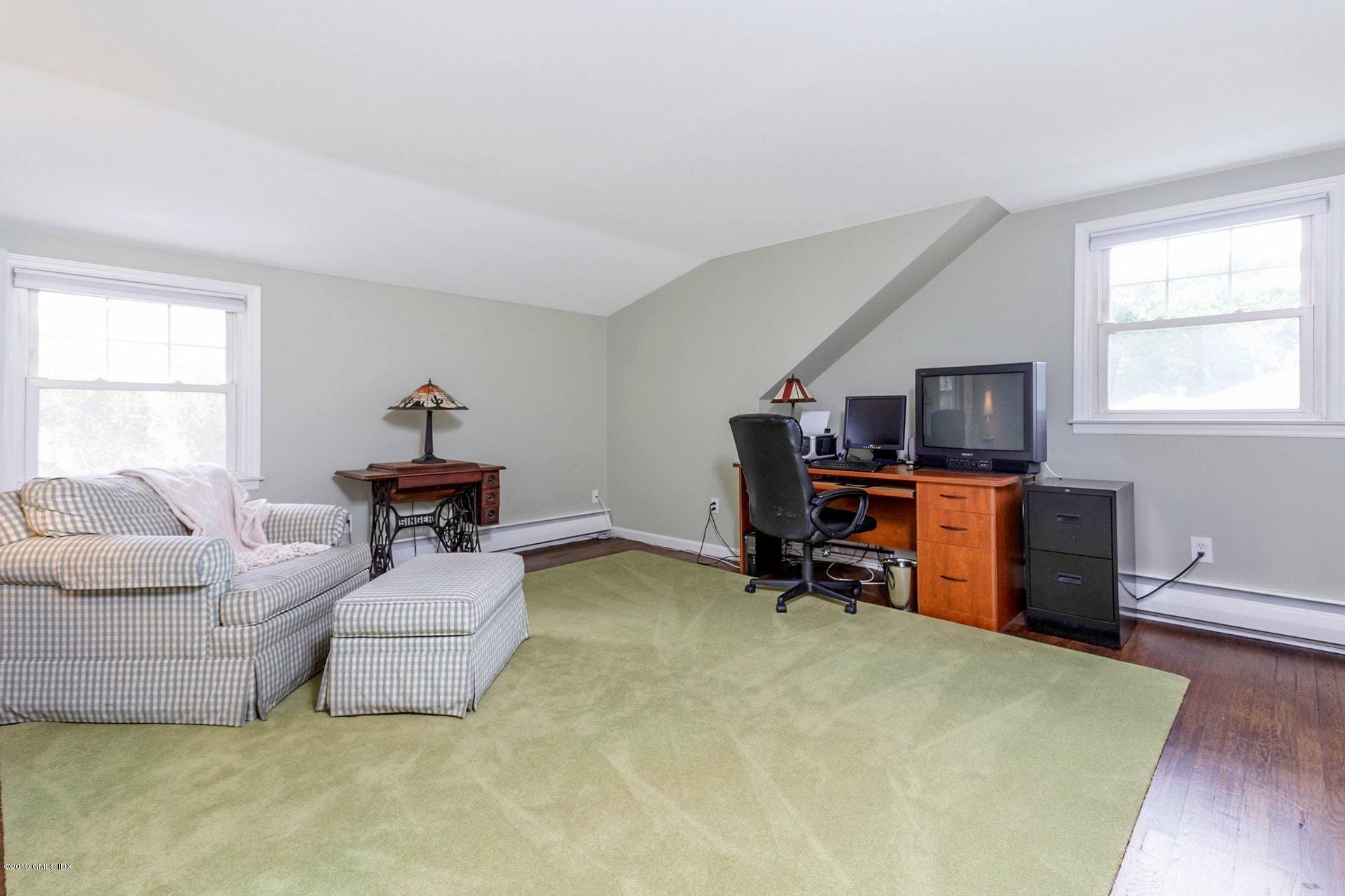 37 Meyer Place Riverside, CT 06878 - Photo 15 of 25 a living room with furniture and a wooden floor