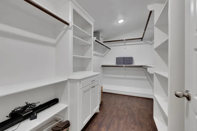 a view of a storage & utility room with wooden floor