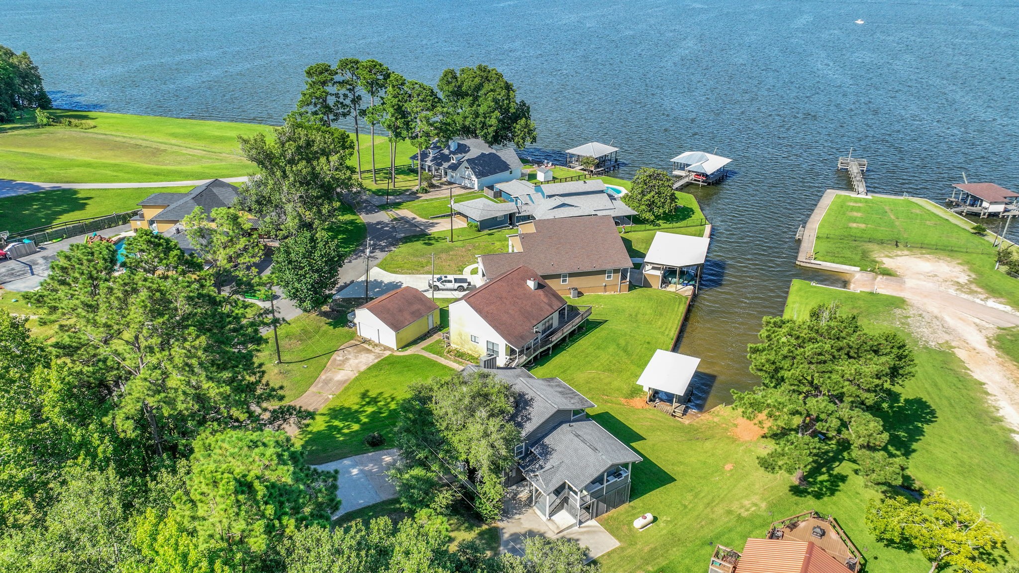 20 Ridgeway Drive Coldspring, TX 77331 - Photo 29 of 40 a view of a swimming pool with a yard