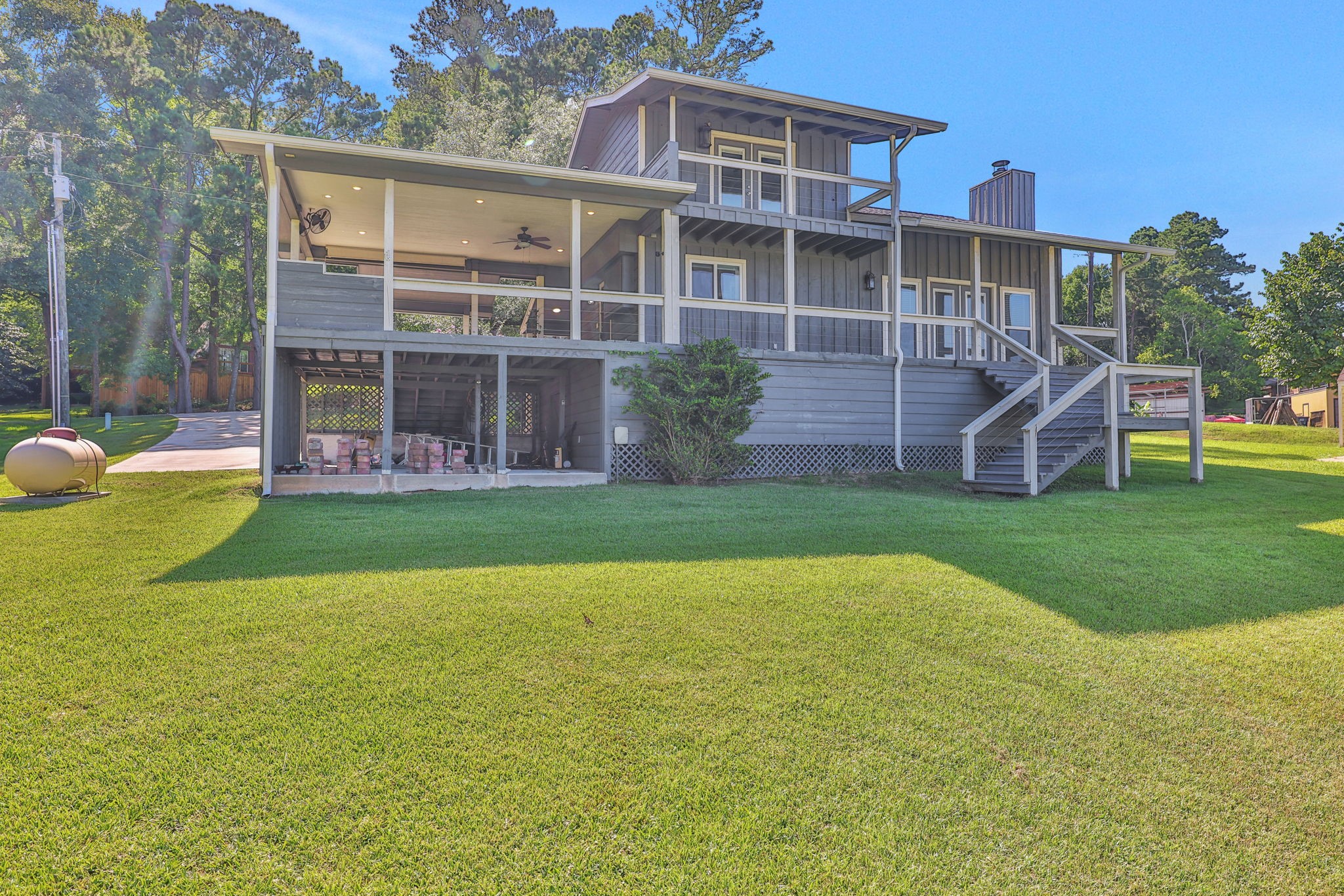 20 Ridgeway Drive Coldspring, TX 77331 - Photo 32 of 40 a view of a house with a yard and sitting area