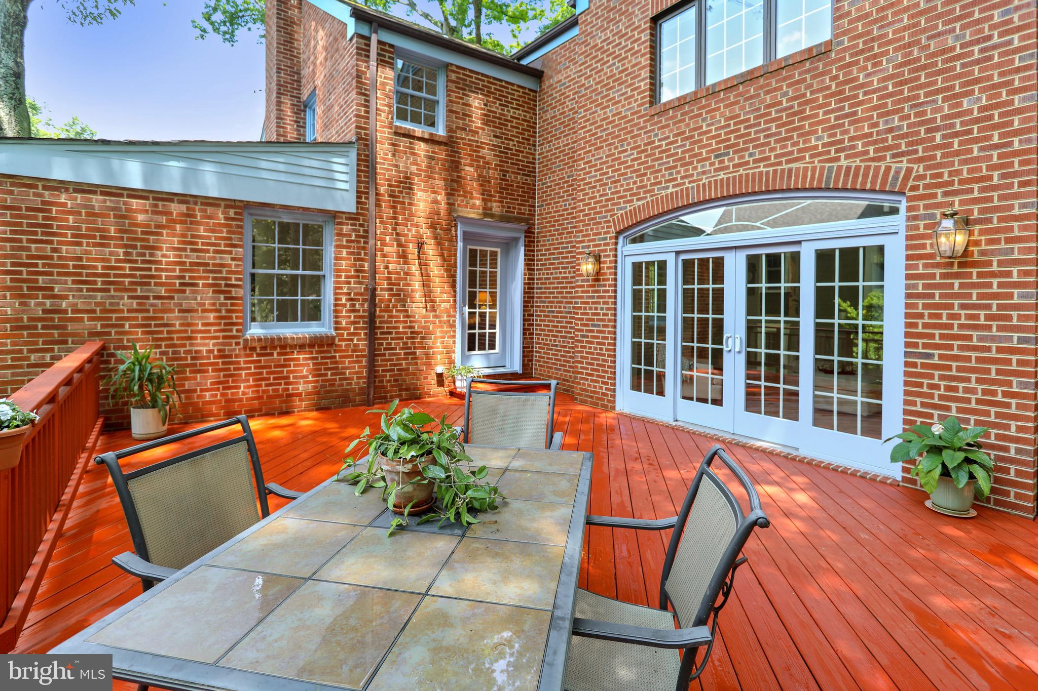 6308 Alcott Road Bethesda, MD 20817 - Photo 29 of 34 Lg. deck with doors to great room and living room