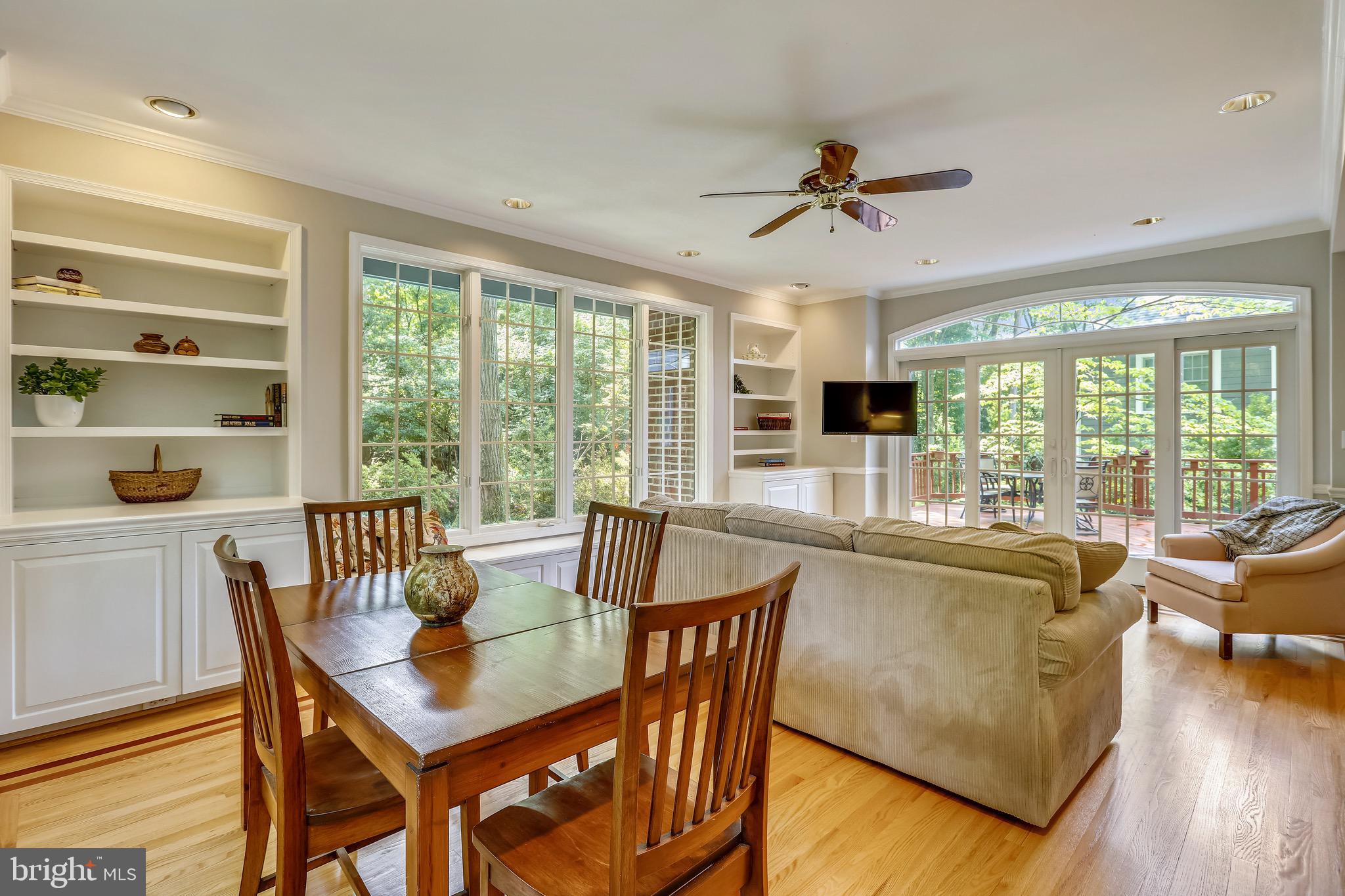 6308 Alcott Road Bethesda, MD 20817 - Photo 4 of 34 Great room w/built-ins, lg. windows backs to trees
